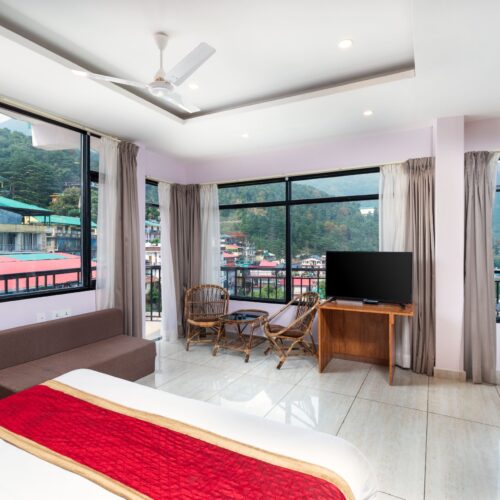 Family Room with 2 Interconnected Rooms at Buddha’s Abode, McLeodGanj – Spacious stay for families and groups with modern comforts.